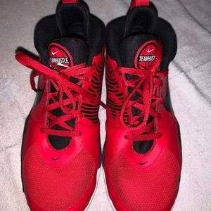 Nike red basketball shoes, size 5